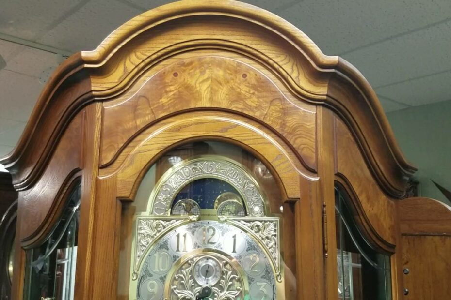 Howard Miller Grandfather Clock With Glass Shelves